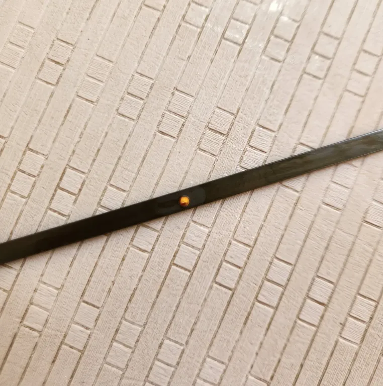 Broken engine oil dipstick in engine bay