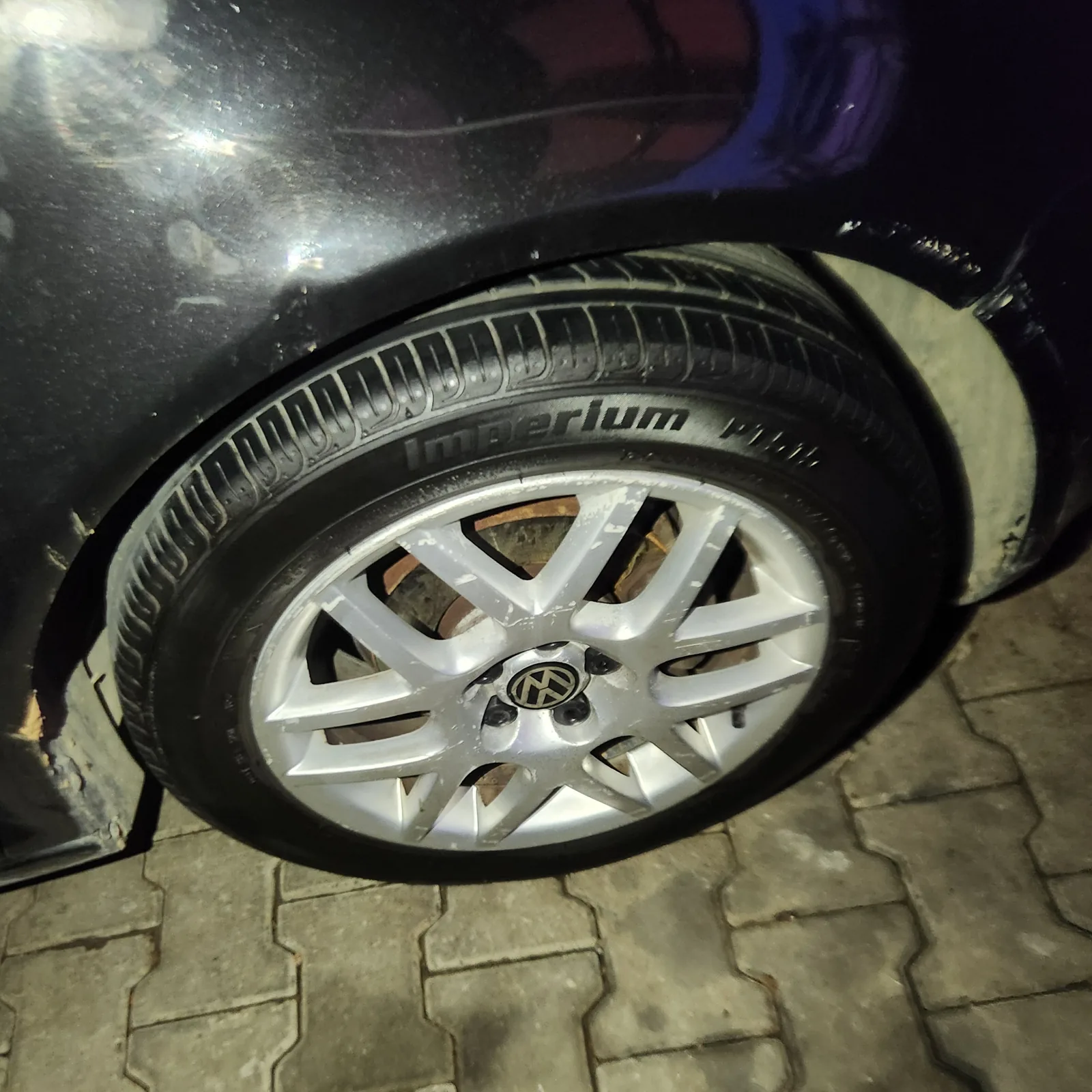 Cleaning and dressing of the tire sidewalls.