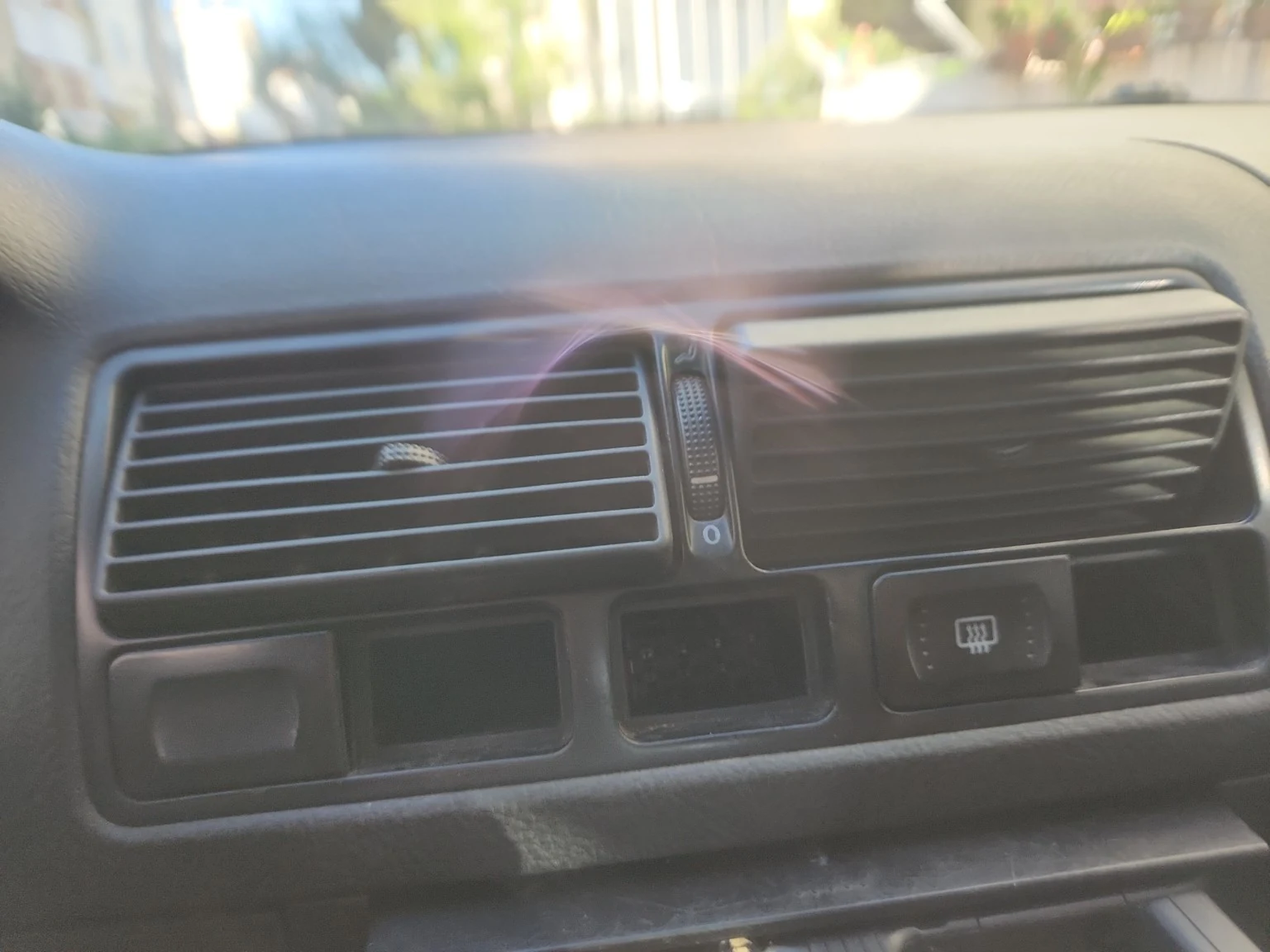 Dashboard area and hazard switch section checked during diagnosis.