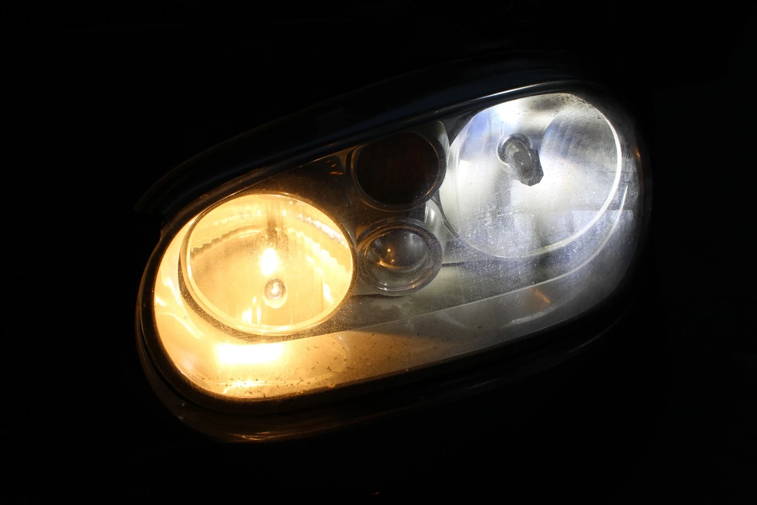 Close-up showing the renewed front position light and low beam colour match.